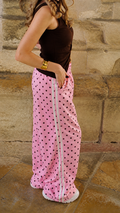 Pantalon à pois rose